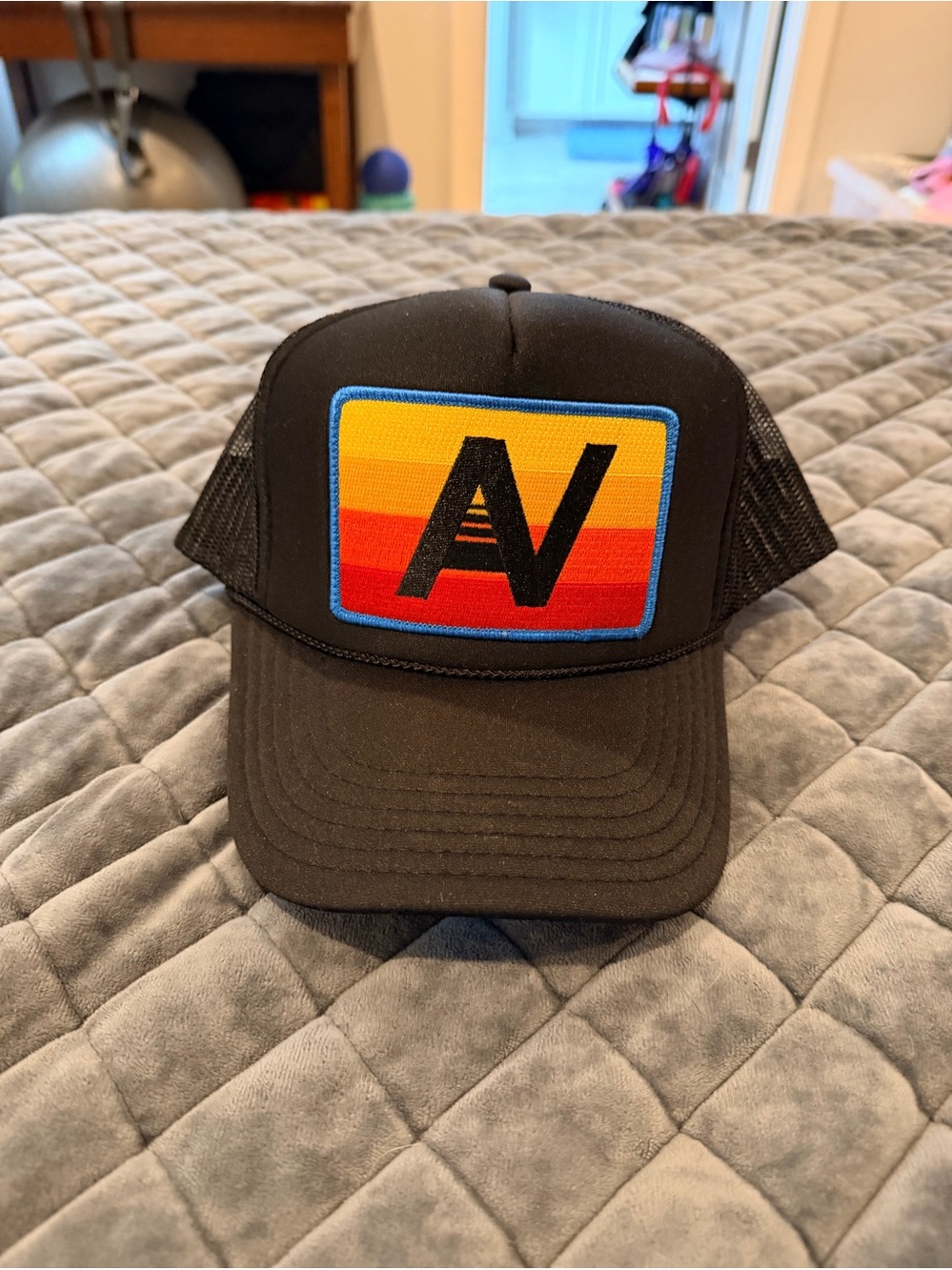 Black Trucker Hat with Sunset Patch